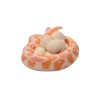 Snake keychain with eggs